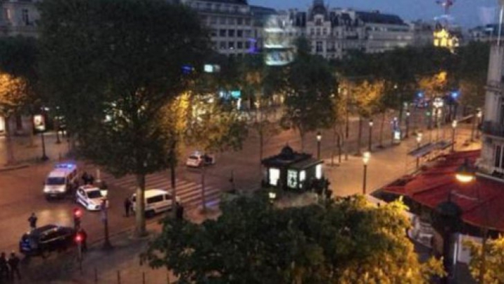 FOCURI DE ARMĂ la Paris, pe bulevardul Champs-Elysees. Un polițist a fost UCIS, iar altul - rănit (FOTO)