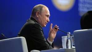 Putin anunță victorios că țara a ieșit din criza economică