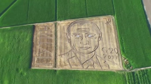 Portretul președintelui rus, Vladimir Putin, pe un CÂMP din Italia