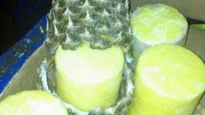 DROGURI ASCUNSE ÎN ANANAȘI. 745 kg de cocaină au fost confiscate în țările iberice