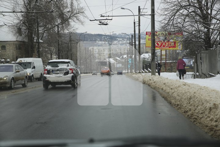 Cum arată Chișinăul după ninsoarea de primăvară (FOTOREPORT)