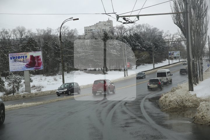 Cum arată Chișinăul după ninsoarea de primăvară (FOTOREPORT)