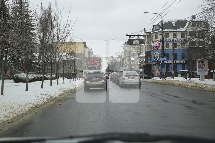 Cum arată Chișinăul după ninsoarea de primăvară (FOTOREPORT)