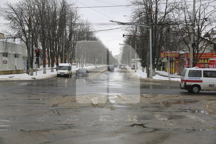 Cum arată Chișinăul după ninsoarea de primăvară (FOTOREPORT)