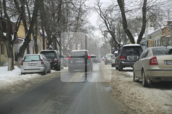 Cum arată Chișinăul după ninsoarea de primăvară (FOTOREPORT)