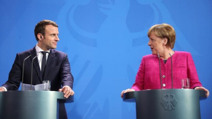  Angela Merkel şi Emmanuel Macron promit găsirea până în iunie a unui compromis franco-german privind reformarea UE