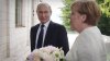 "Mesajul ascuns" al gestului lui Putin. De ce i-a oferit flori Angelei Merkel
