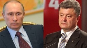 Vladimir Putin a avut o discuţie telefonică cu Petro Poroşenko. Despre ce au vorbit oficialii