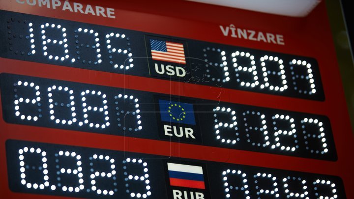 Valuta naţională continuă să crească! Cât va costa mâine un euro şi un dolar