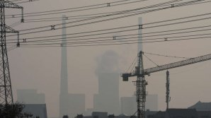 Cod galben de poluare la Beijing. Oamenii sunt rugați să ia măsuri de precauţie