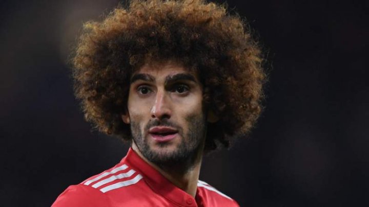 Mijlocaşul belgian al echipei Manchester United, Marouane Fellaini, a renunţat la frizura afro