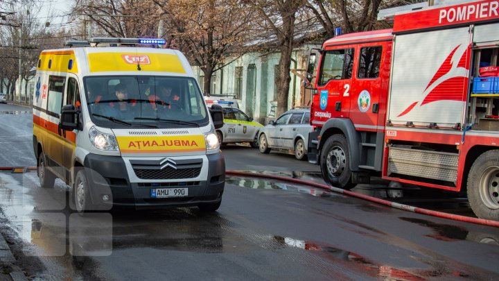 INCENDIU în centrul Capitalei. Pompierii, la faţa locului. O femeie s-a ales cu arsuri (FOTOREPORT)