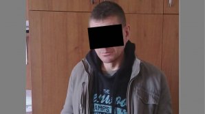 Un bărbat, reţinut de poliţie pentru că l-a luat la pumni pe un tânăr şi l-a jefuit