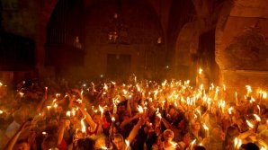 BUCURIE pentru enoriaşi. FOCUL HARIC S-A APRINS. Când va ajunge în țara noastră (VIDEO)