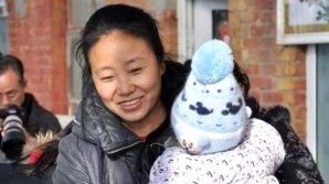 O femeie din China care a adoptat 118 copii a fost condamnată la închisoare pentru fraudă