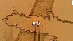 Un artist din Franța face desene pe plajele din Franţa