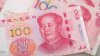 Yuanul s-a depreciat la cel mai redus nivel faţă de dolar din ultimii 11 ani