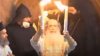 Câțiva credincioși ortodocși din Ierusalim au asistat la aprinderea Luminii Sfinte (VIDEO)