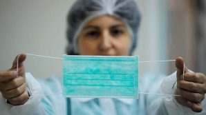 Studiu: Dacă populaţia lumii ar purta măşti, virusul ar dispărea