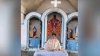 Liturghie ținută într-o biserică inundată: Credincioşii au intrat în sfântul lăcaş cu bărcile