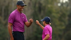 Dinastie în golf. Tiger Woods a participat în premieră la un turneu cu fiul său, Charlie