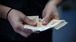 Creditele în monedă naţională s-ar putea scumpi. BNM a majorat rata de bază