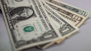 Dolarul s-a depreciat semnificativ, după publicarea datelor privind rata inflației în SUA pentru noiembrie