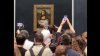 Un bărbat deghizat în femeie a aruncat cu o prăjitură în celebra pictură Mona Lisa