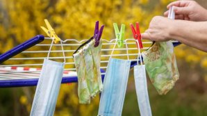 Alertă la nivel mondial. OMS cere guvernelor să reintroducă obligativitatea purtării măştii de protecţie