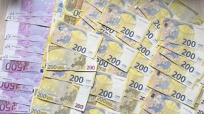 Trei membri ai organizației criminale „Turoc”, reținuți la Chișinău. Din apartamentele acestora au fost ridicați 24.000 de euro