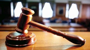 Doi ofițeri de investigație din Capitală, pe banca acuzaților pentru săvârșirea infracțiunii de corupere pasivă