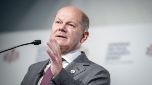 Olaf Scholz cere țărilor UE să treacă la producția în masă de armamente, după amenințările lui Donald Trump