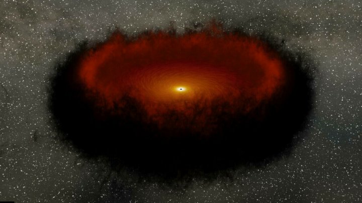 Astronomi israelieni au descoperit o enigmatică gaură neagră supermasivă, învăluită de praf cosmic