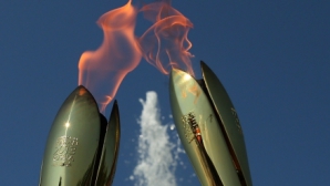 Огонь сочинских Олимпийских игр прибывает в Россию