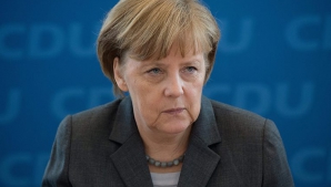 Меркель: санкции ЕС зависят от минских договоренностей