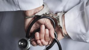 Уролога из Онкоинститута, вымогавшего деньги у пациента, отстранят от должности