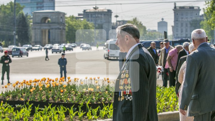 В Кишиневе поминают жертв аварии на Чернобыльской АЭС: фоторепортаж 