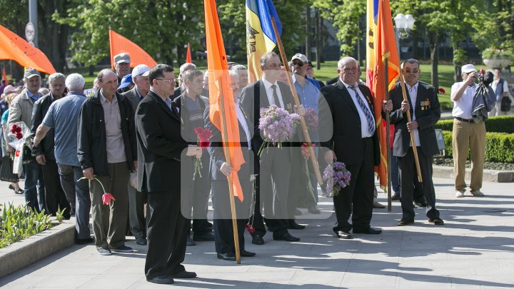 В Кишиневе поминают жертв аварии на Чернобыльской АЭС: фоторепортаж 