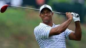 Американский гольфист Тайгер Вудс одержал первую победу в турнире за последние 5 лет