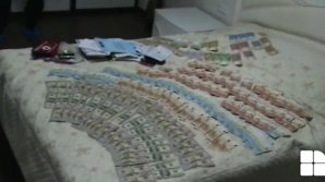 Разнообразие валют и документы: представлены итоги обысков у судьи Александра Георгиеша (ВИДЕО)