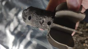 Вынесли хлам из дома: в Тирасполе в мусоре нашли хвостовую часть снаряда и ящики с патронами